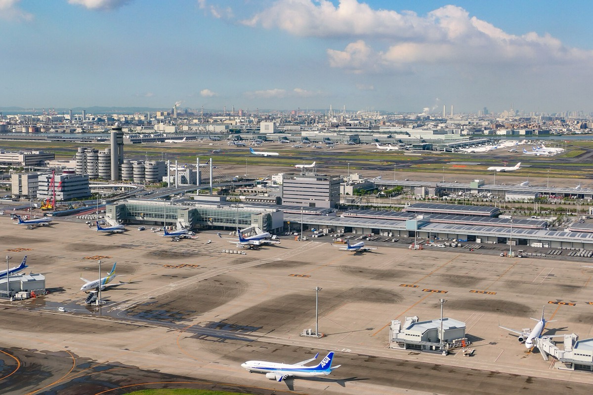 Aerial view of Tokyo Haneda Airport, with the Terminal 2 satellite and aprons